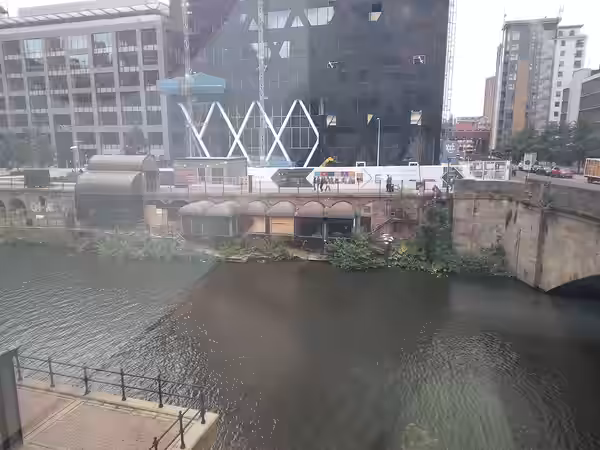 The remains of the Mark Addy pub, on the River Irswell, Manchester. or technically Salford. As viewed from the window of the People's History Museum. The bar wa (2023)