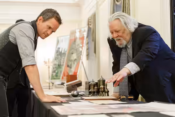 Neil Patrick Harris looks through a display of Harry Houdini Collection items with Rare Book and Special Collections Division Chief Mark Dimunation in the Whitt (2019)