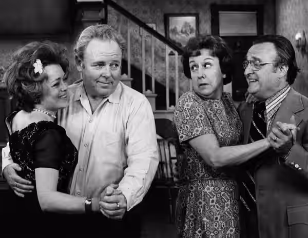 Photo of Rue McClanahan and Vincent Gardenia as Ruth and Curtis Rempley with Carroll O'Connor and Jean Stapleton as Archie and Edith Bunker. When Edith invites  (1972)