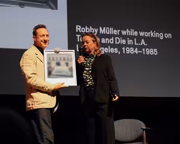 Lol Crawley receiving the Bobby Müller oeuvre Award at the 54th International Film Festival Rotterdam
