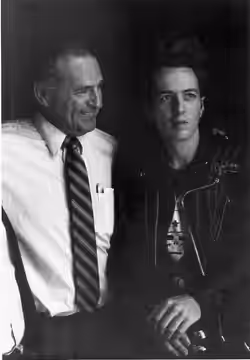 Gene Baur, manager of the Park Plaza Hotel, with Joe Strummer at a press conference held at the Park Plaza in 1983. (2022)