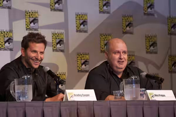 Bradley Cooper and Alex Proyas speaking during the Paradise Lost segment of the Legendary Pictures panel at the 2011 Comic-Con International Please attribute to