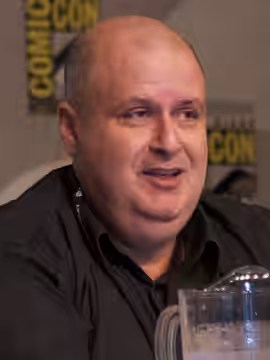 Bradley Cooper and Alex Proyas speaking during the Paradise Lost segment of the Legendary Pictures panel at the 2011 Comic-Con International Please attribute to