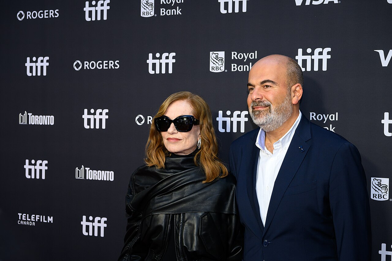 Isabelle Huppert and Marc Fitoussi pose together at the screening for "All About Corinne" at the 2026 Toronto International Film Festival.
