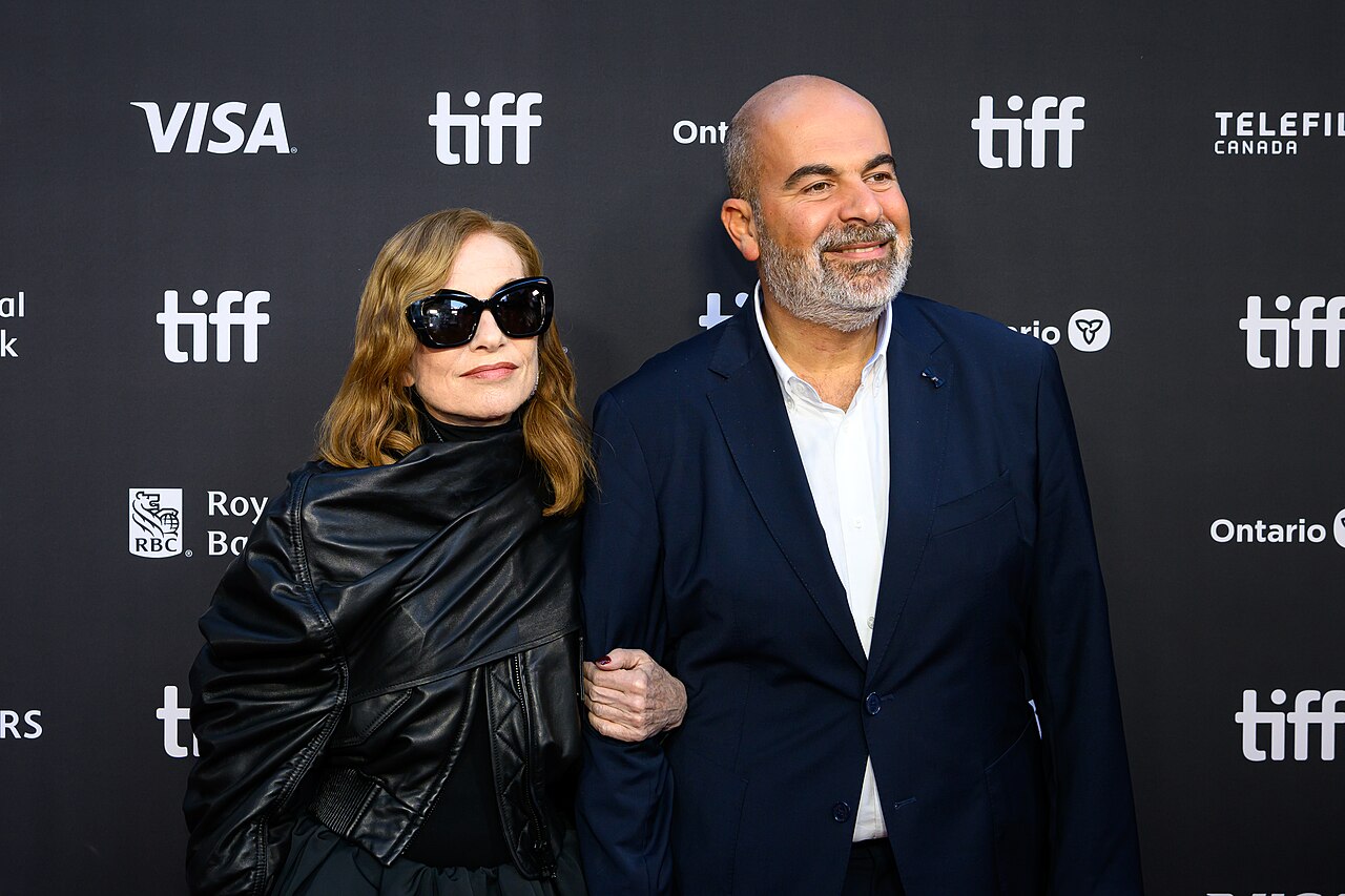 Isabelle Huppert and Marc Fitoussi pose together at the screening for "All About Corinne" at the 2026 Toronto International Film Festival.