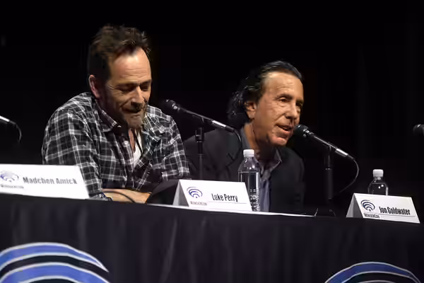 Luke Perry and Jon Goldwater speaking at the 2017 WonderCon, for "Riverdale", at the Anaheim Convention Center in Anaheim, California. Please attribute to Gage 