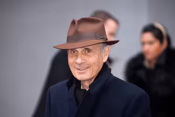 French actor and singer Guy Marchand leaving the press conference for the movie L’arbre et la forêt. (2010)
