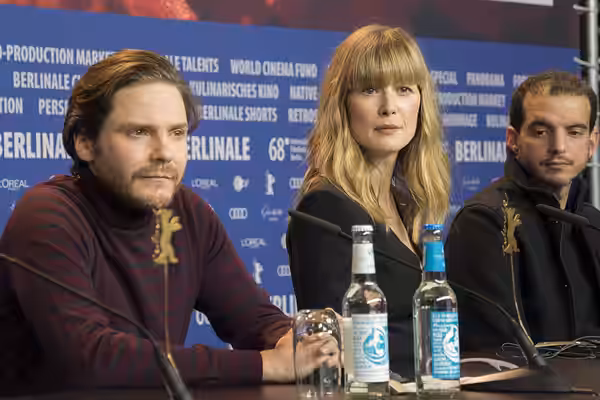 Press conference of 7 Days in Entebbe at Berlinale 2018. Daniel Brühl, Rosamund Pike, Omar Berdouni