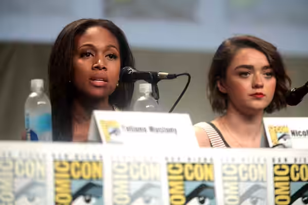 Nicole Beharie and Maisie Williams speaking at the 2014 San Diego Comic Con International, for "Entertainment Weekly: Women Who Kick Ass", at the San Diego Conv