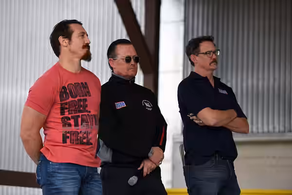 UFC fighter Tim Kennedy and actors Robert Patrick and Matthew Lillard watch from the side of the stage during a USO performance at Camp Bondsteel, Kosovo, as Ar (2016)