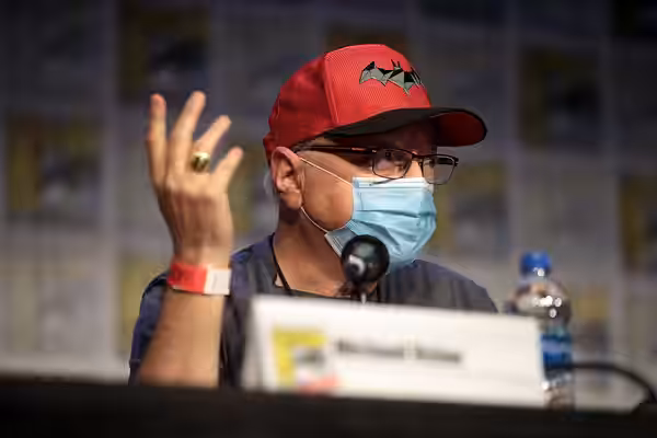 Michael Uslan speaking at the 2021 San Diego Comic Con Special Edition, for "Darknights and Daydreams: From Batman to Broadway", at the San Diego Convention Cen