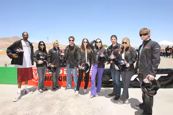 All of the celebrities that drove the All-New Dodge Challenger. Including (from left to right): Snoop Dogg, Audrina Patridge, David Spade, Rob Lowe, Michelle Tr (2008)