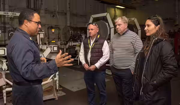 181208-N-IU965-1005 PACIFIC OCEAN (Dec. 8, 2018) Aviation Machinist’s Mate 1st Class Willy Crucetanunez briefs former astronaut Capt. (Ret.) Mark Kelly, left, f (2014)