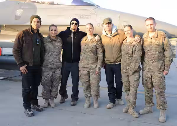 Actors Adam Rodriguez, Nick Zano and Channing Tatum pose for a photo with Airmen during a tour at Bagram Air Field, Afghanistan Feb. 6, 2015. Rodriguez, Zano an
