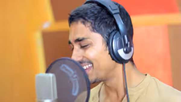 Actor Siddharth records his voice for the Tamil language version of the TeachAIDS animation at Rajiv Menon Productions in Chennai, Tamil Nadu. Photo credit: Tea (2013)