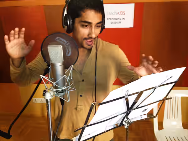 Actor Siddharth records his voice for the Tamil language version of the TeachAIDS animation at Rajiv Menon Productions in Chennai, Tamil Nadu. Photo credit: Tea (2013)