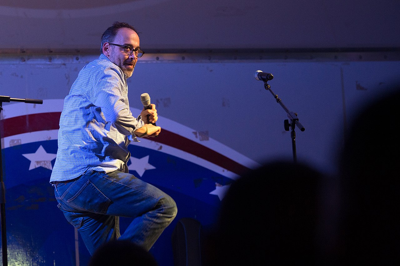 David Wain, comedian and producer, dances during a USO show for US service members deployed at Camp Lemonnier, Djibouti on Dec 6, 2015. The Chairman, along with