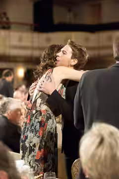 Betsy Brandt and Jordan Gavaris at the 73rd Annual Peabody Awards. (2014)