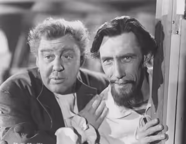 Charles Laughton and John Carradine in Captain Kidd (1945) - cropped screenshot