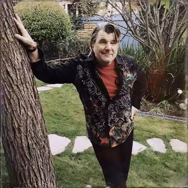 Composer Christopher Young in his back yard (2025)
