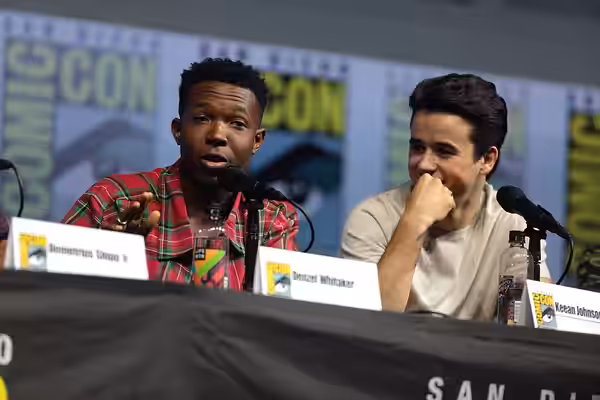 Denzel Whitaker and Keean Johnson speaking at the 2018 San Diego Comic Con International, for "Cut Throat City", at the San Diego Convention Center in San Diego