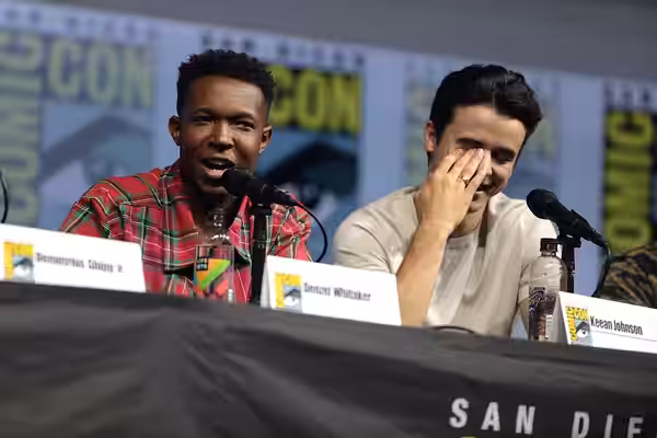 Denzel Whitaker and Keean Johnson speaking at the 2018 San Diego Comic Con International, for "Cut Throat City", at the San Diego Convention Center in San Diego