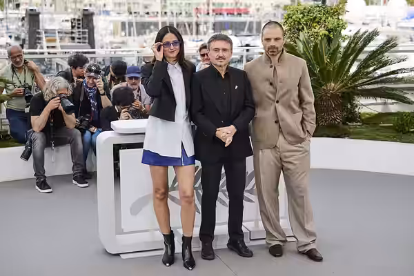 Renate Reinsve, Cristian Mungiu and Sebastian Stan pose during the "Fjord" photocall at the 79th annual Cannes Film Festival at Palais des Festivals on May 19,  (2026)