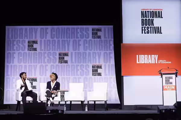Janelle Monae discusses her book, "The Memory Librarian," with Kyle Dargan on the Main Stage at the 2022 National Book Festival, September 3, 2022. Photo by Sha