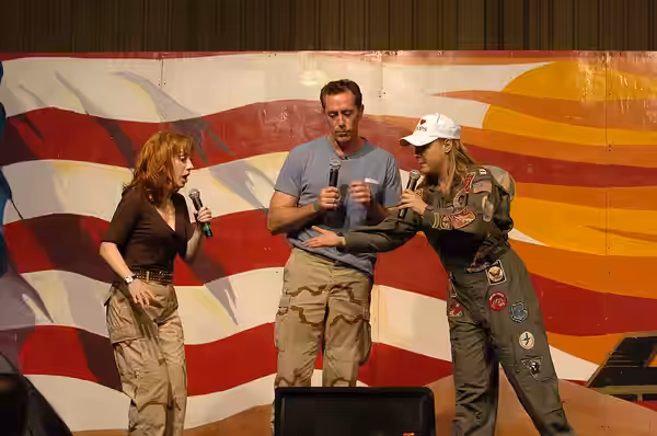 TIKRIT, Iraq (Mar. 17, 2006) -- Kathy Griffin, Karri Turner and Michael McDonald perform an improv skit for Soldiers and Airmen of Task Force Band of Brothers a