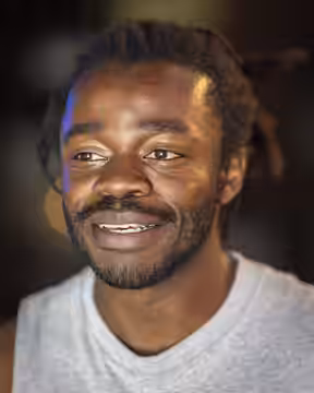 Photo of Demi Adejuyigbe onstage at Caveat, a comedy venue. (2025)