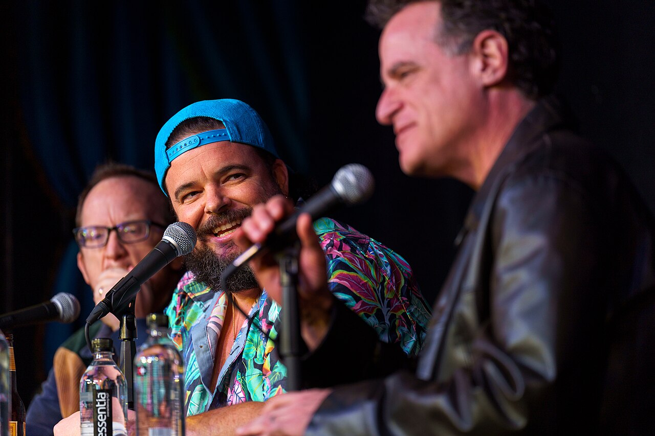 Jon Gabrus performs at improv4humans at SXSW 2024. Also pictured: Chris Gethard (left) and Matt Besser (right)