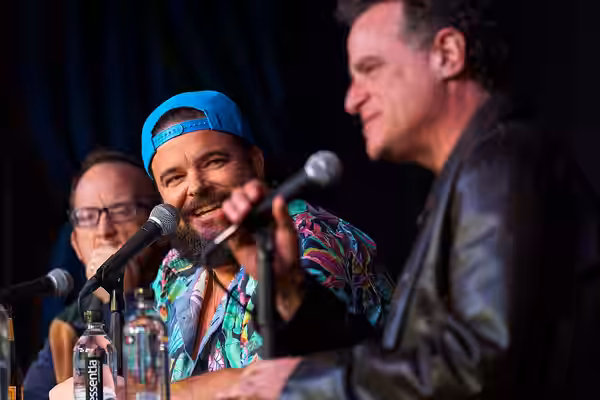 Jon Gabrus performs at improv4humans at SXSW 2024. Also pictured: Chris Gethard (left) and Matt Besser (right)