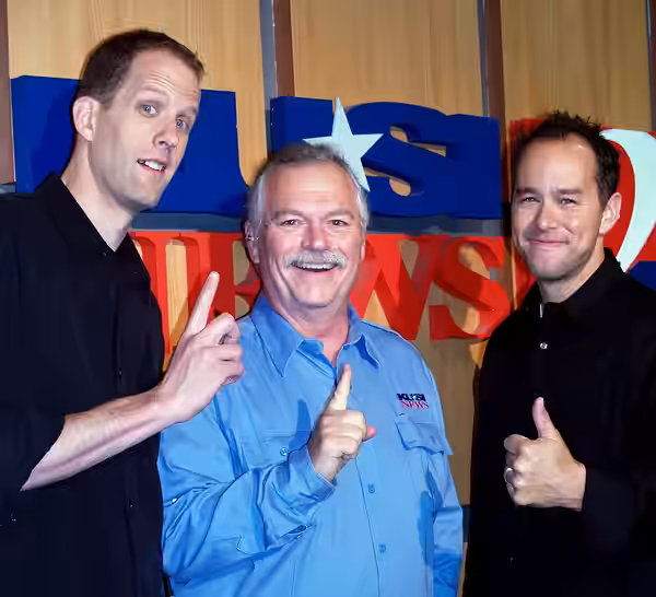 A photo of Pete Docter (left), Jonas Rivera (right) with KUSI-TV's Phil Konstantin. Docter directed, and Rivera produced Up. (2009)