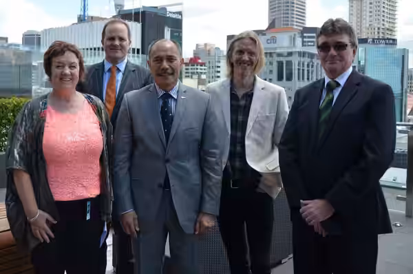 Dignitaries at the "Our Nation's Children" launch on 29 November 2013. Left to right: MC Sue Foley, Simon Power of Westpac, the Governor-General, Sir Jerry Mate