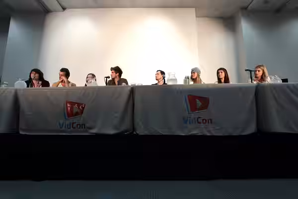 Michael Gallagher, Pierson Fode, Whitney Milam, Joey Graceffa, Jake Thomas, Jessica Lu, Devyn Smith and Kristina Cole speaking at the 2014 VidCon at the Anaheim