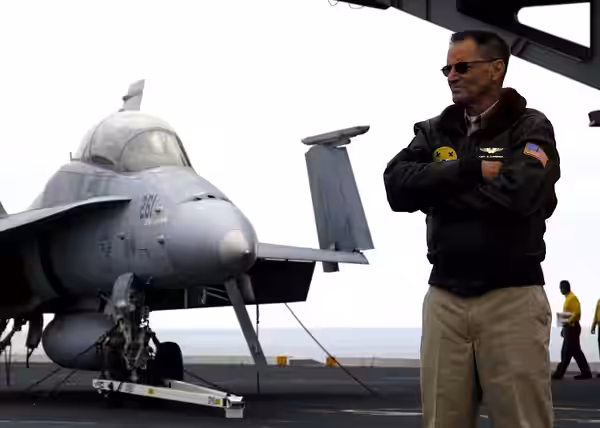 Actor Sam Shepard mulls over a scene in the upcoming motion picture "Stealth," while filming aboard the Nimitz-class aircraft carrier USS Abraham Lincoln (CVN 7 (2004)