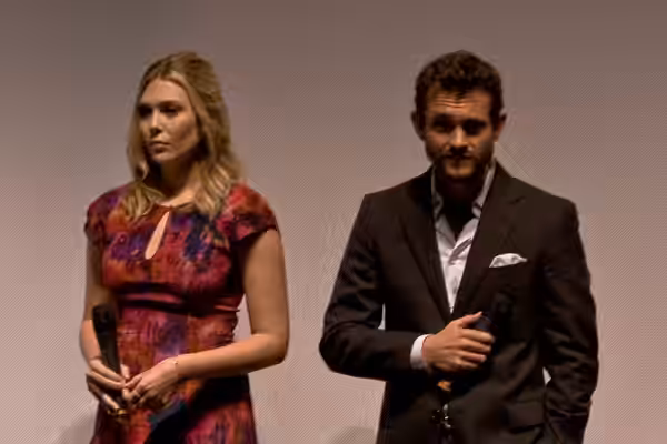 Elizabeth Olsen and Hugh Dancy At the premiere of "Martha Marcy May Marlene", directed by Sean Durkin, during the Toronto International Film Festival, 2011.