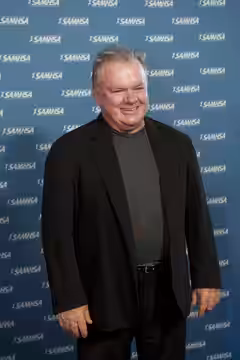 The Fighter's Jack McGee walks the red carpet at the 2011 Voice Awards. McGee presented a 2011 Voice Award to the writers and producers of the Oscar©-nominated 