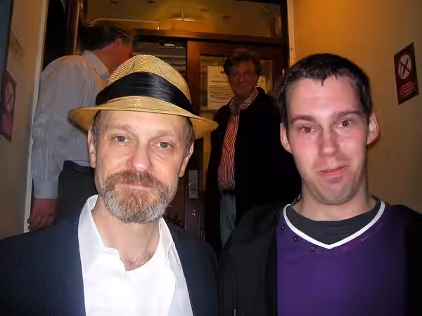 David Hyde Pierce, Jimmy Johansson and Brian Hargrove (in the background) outside Harold Pinter Theatre (formerly Comedy Theatre). (2010)