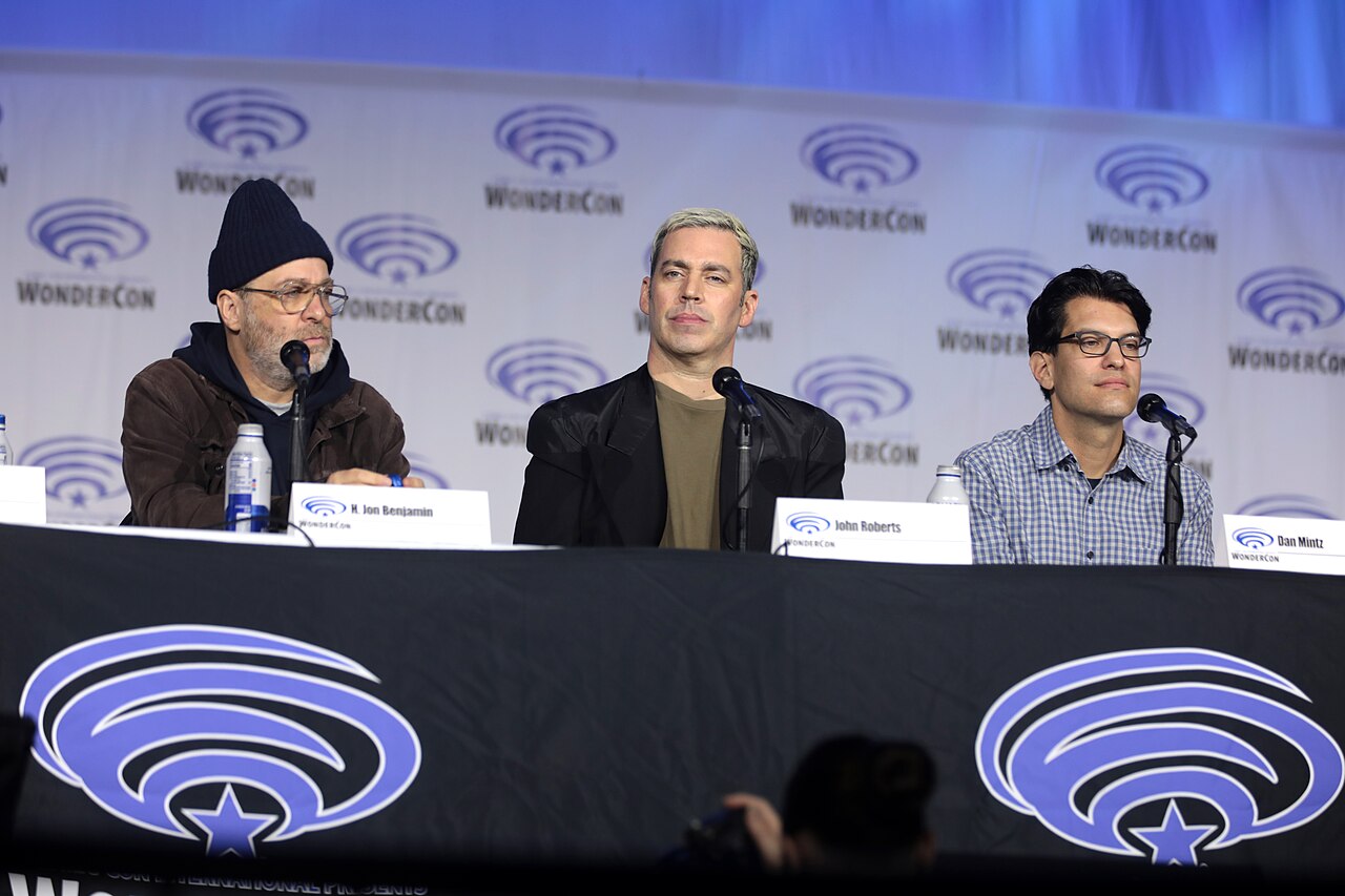 H. Jon Benjamin, John Roberts and Dan Mintz speaking at the 2022 WonderCon, for "The Bob's Burgers Movie", at the Anaheim Convention Center in Anaheim, Californ