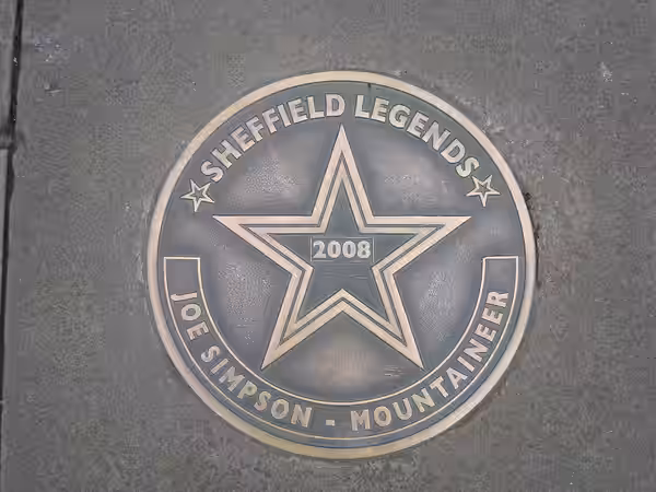 Commemorative star in the pavement outside Sheffield Town Hall: a "walk of fame" for people associated with the city. Joe Simpson, mountaineer. (2017)