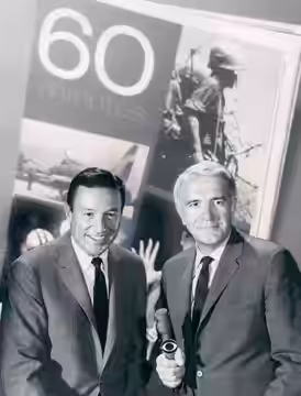Publicity photo of Mike Wallace and Harry Reasoner from the premiere of 60 Minutes.