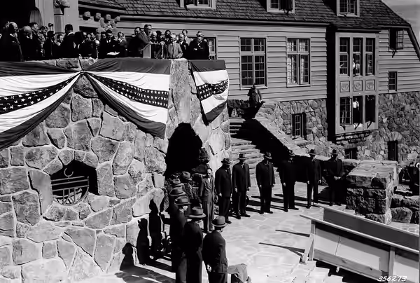 President F. D. Roosevelt delivering the dedication address, Timberline Lodge, September 28, 1937. The Forest Service Honor Guard are shown in a semi-circle bel