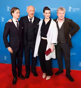 The actor Tom Schilling, Director Oliver Hirschbiegel, actress Friederike Becht and actor Jörg Schüttauf of The Same Sky at the Berlinale 2017