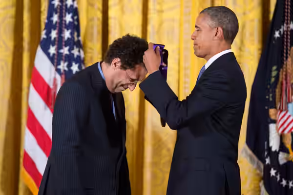 Playwright Tony Kushner receives a National Medal of Arts from President Barack Obama at the White House. (2013)