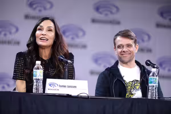 Famke Janssen and Nick Stahl speaking at the 2023 WonderCon, for "Knights of the Zodiac", at the Anaheim Convention Center in Anaheim, California. Please attrib