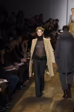 A model walks the runway at the Michael Kors Fall/Winter 2010 show at New York Fashion Week, February 2010.