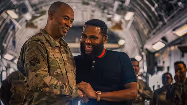 U.S. Air Force Maj. Gen. Edward Evans, Assistant Adjutant General-Air and Commander, Mississippi Air National Guard, left, and actor Anthony Anderson laugh with