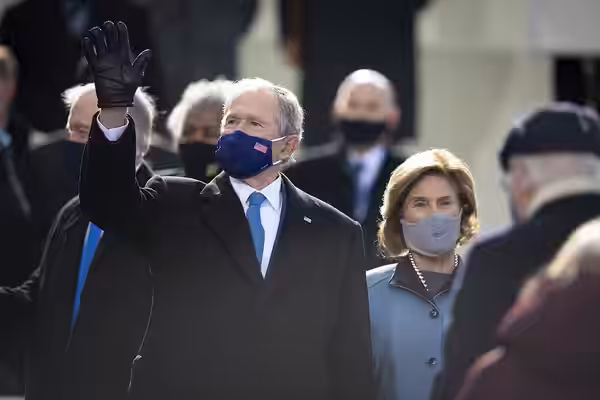 Former President George W. Bush waves during the 59th Presidential Inauguration ceremony in Washington, Jan. 20, 2021. President Joe Biden and Vice President Ka