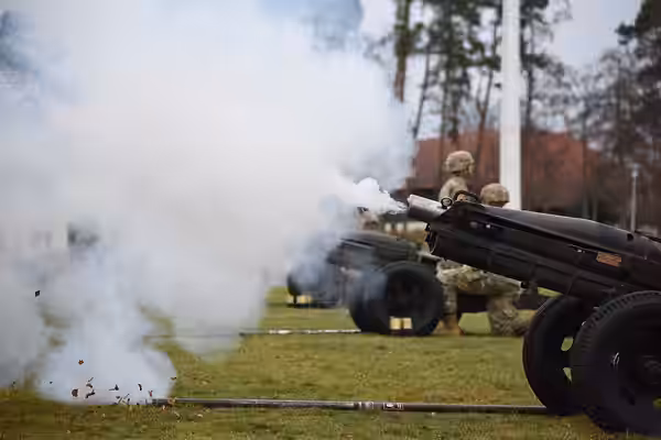Cannons from the Field Artillery Squadron, 2nd Calvary Regiment, 7th Army Training Command fire off for a 21-gun salute to honor the late President George H. W.